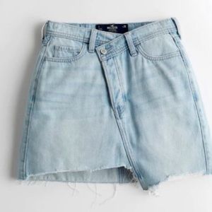 ULTRA HIGH-RISE CROSSOVER DENIM MINI SKIRT. NWOT